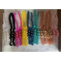 Tramas de pérolas com flor e pedraria Tramas de pérolas com flor e pedraria