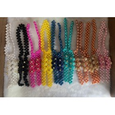 Tramas de pérolas com flor e pedraria Tramas de pérolas com flor e pedraria